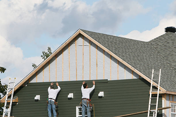Professional Siding Replacement technician working in Lowber, PA
